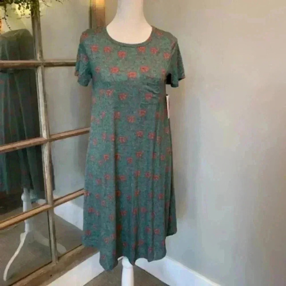 Lularoe Dresses & Skirts - Lularoe Green Floral Carly Dress
